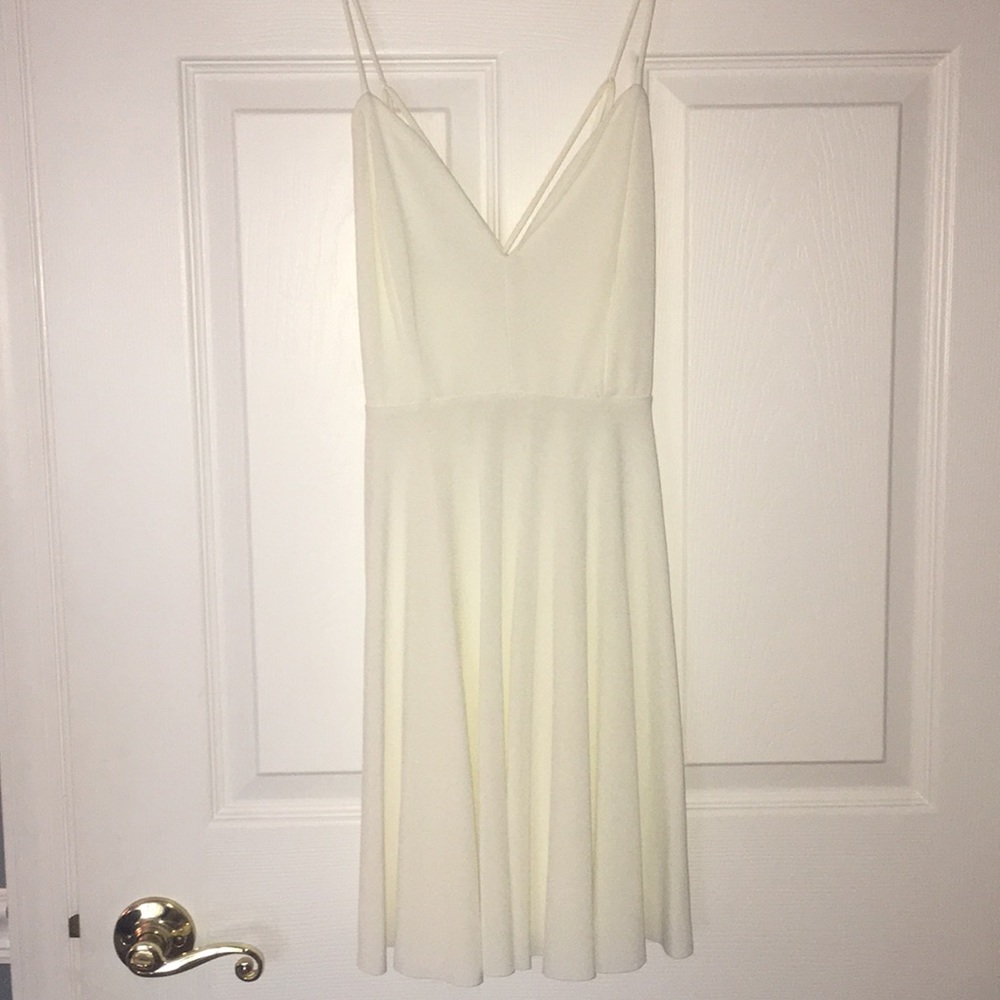 White strappy dress with cinched waist